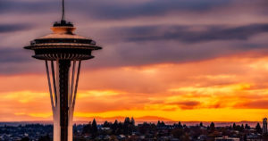 Seattle Space Needle with a beautiful sunset in teh background.