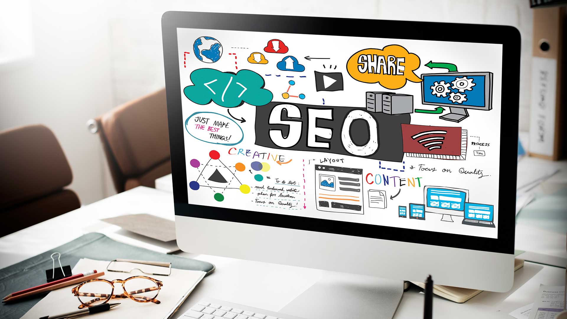 Monitor in desktop with phrase "SEO".