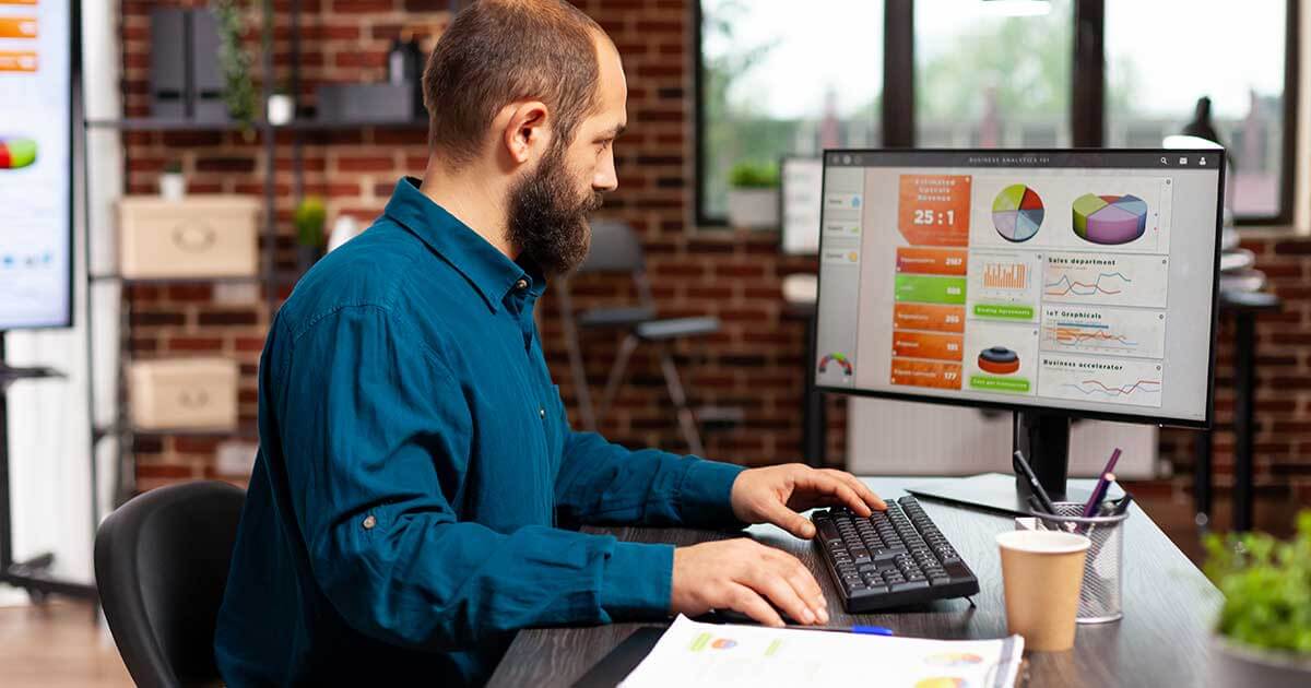 Business owner assesing companies digital profile.