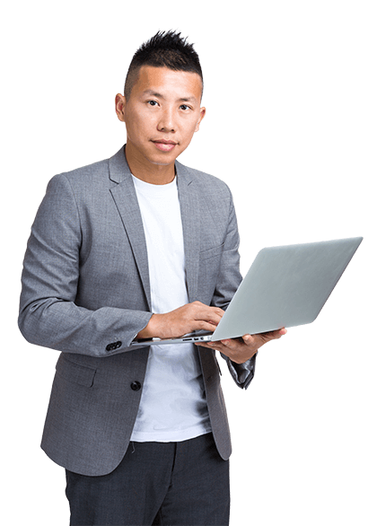 Businessman holding laptop.