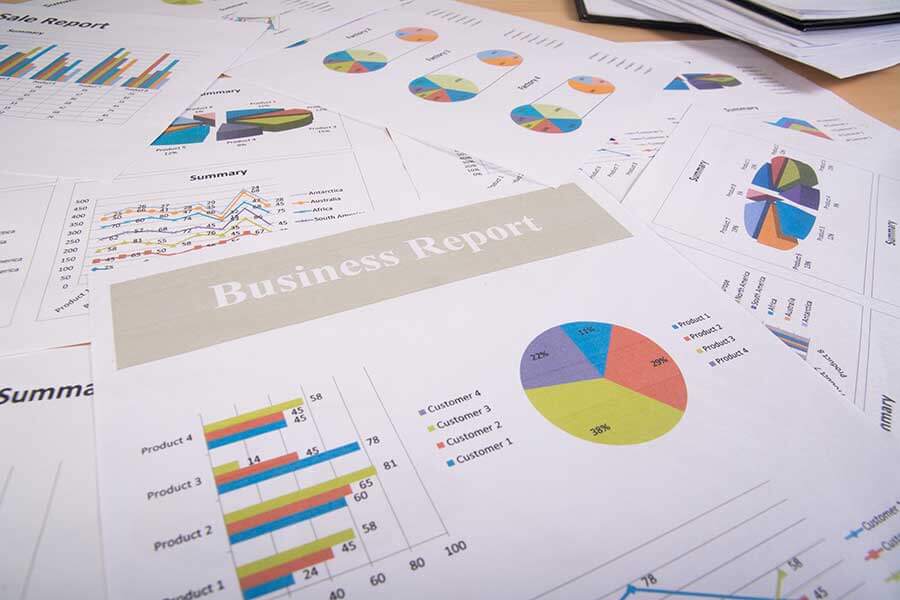 Graphs and charts on business report.