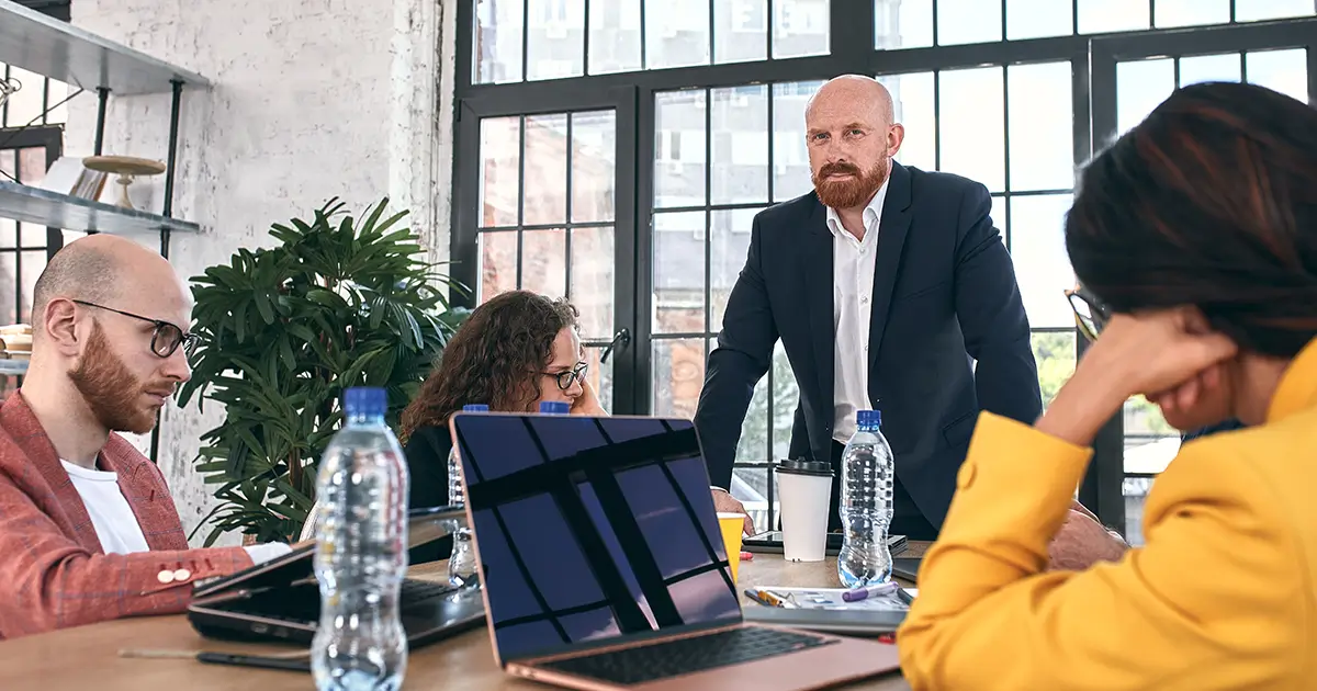 Business team change management strategy discussion.